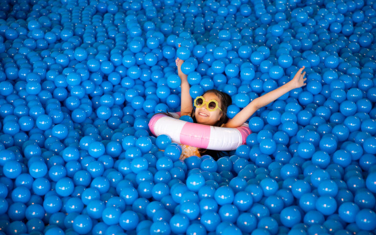 Child Playing in Ball Pit Deerfoot City The Pool Room